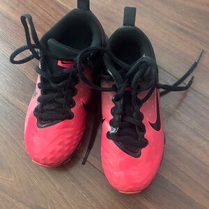 Nike Kids Black and Pink softball/soccer shoes